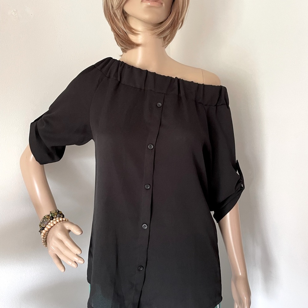 Black blouse, polyester Mayerial. Small size.